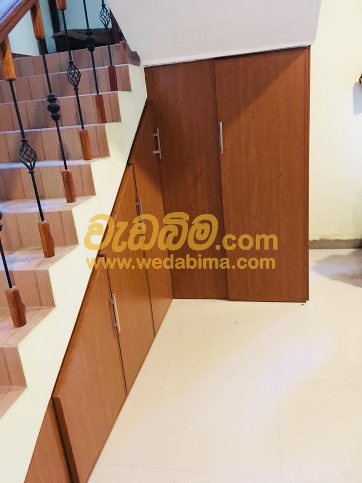 Cover image for wooden staircase cupboard design price in colombo